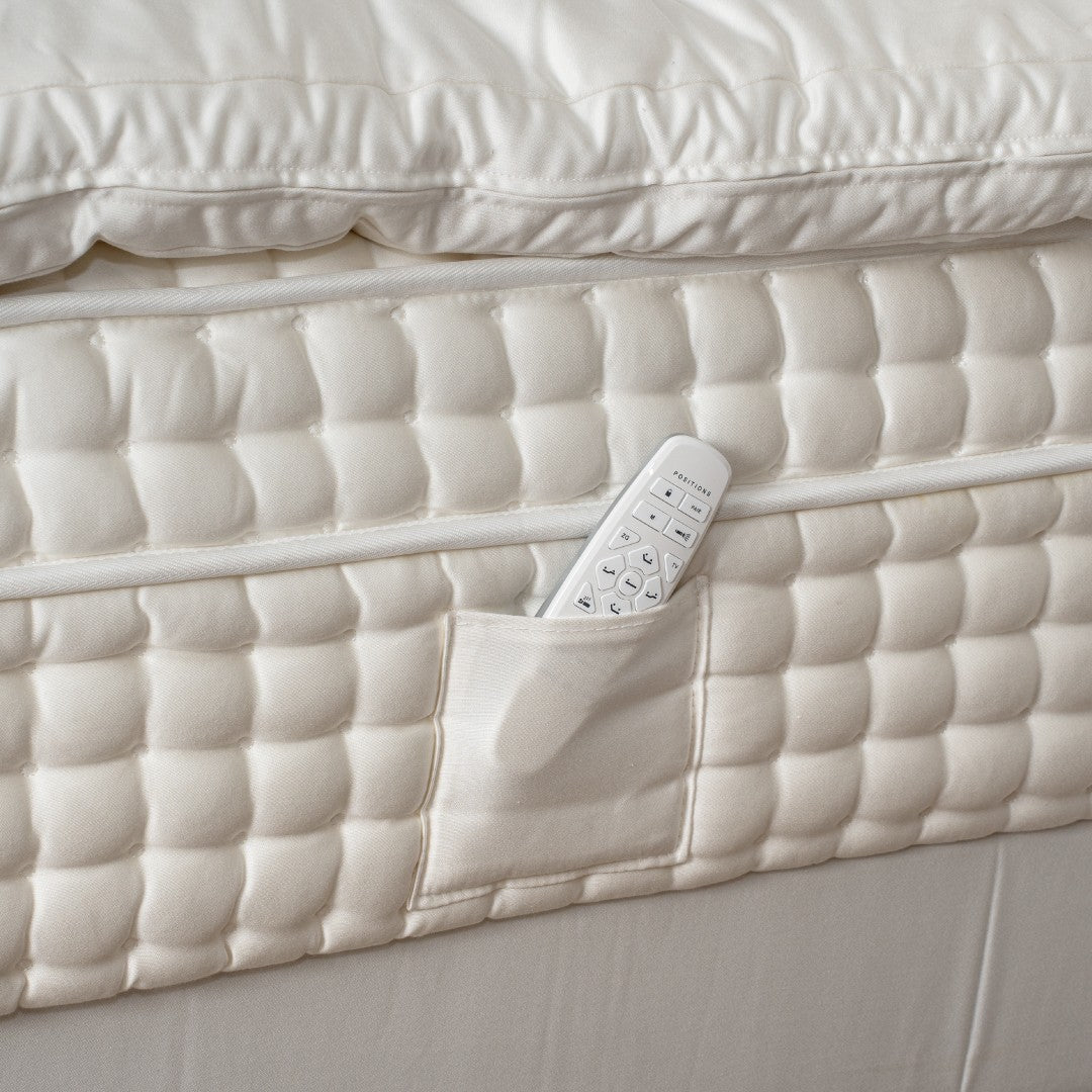 Pearl White bed with remote control pocket
