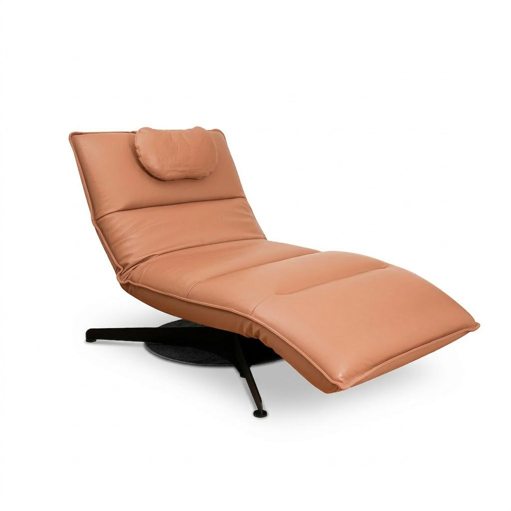 tan lounge chair with a black base on a white background