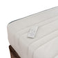 Adjustable bed with a remote control on a white background