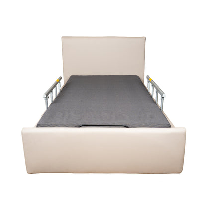 Beige crib with Earth & Grey mattress on a white background