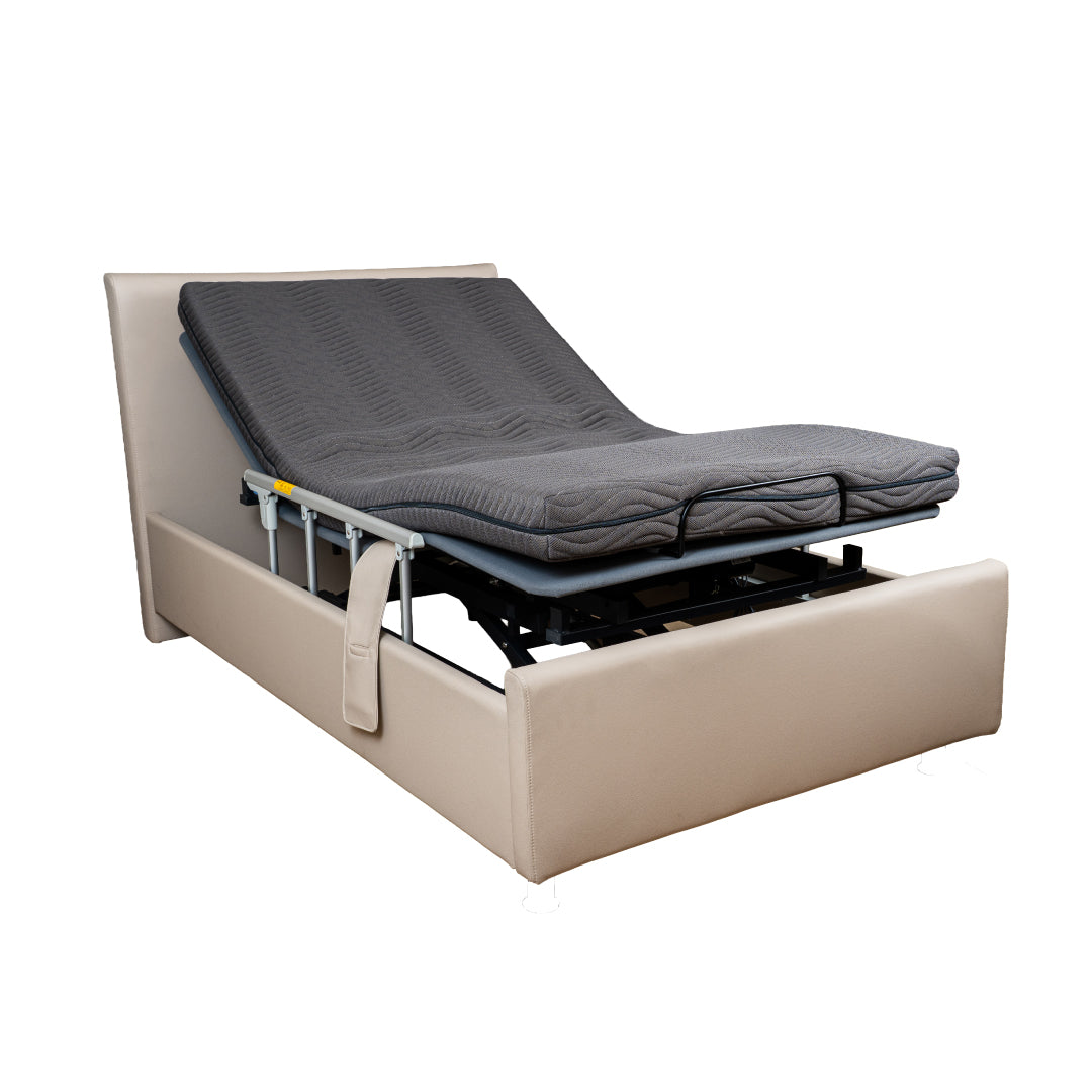 Beige adjustable bed with gray mattress on a white background