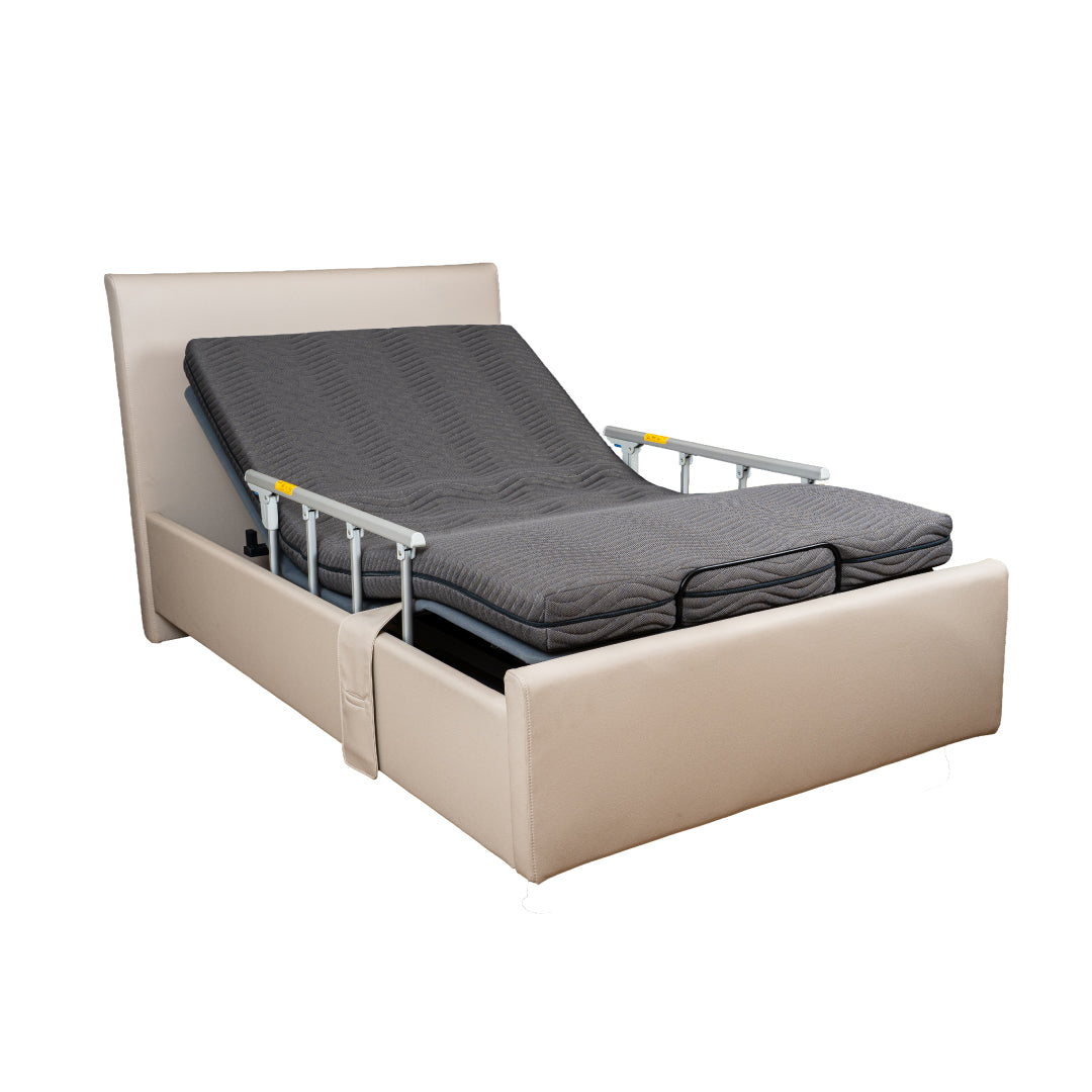 Beige adjustable bed with gray mattress on a white background